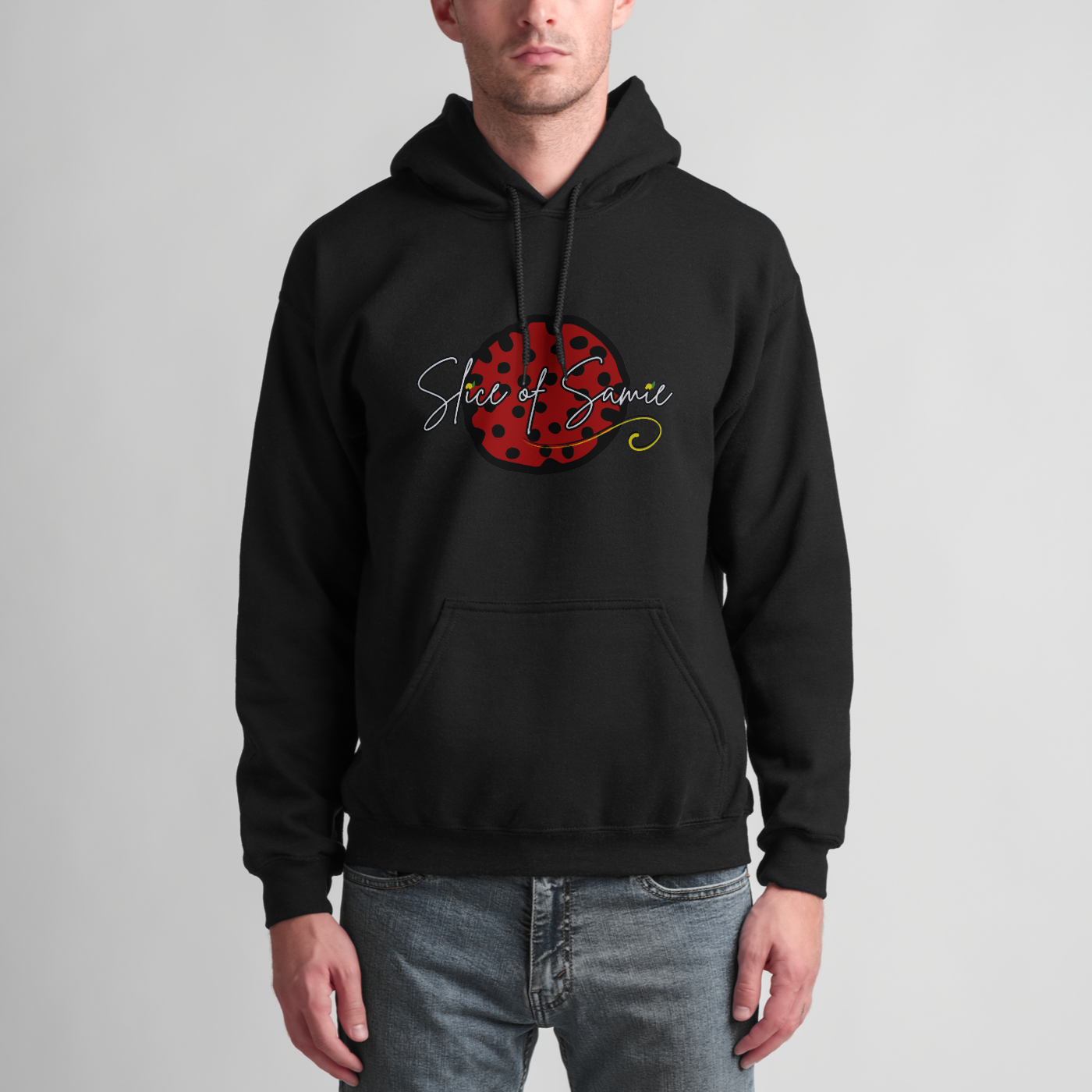 Front of our first hoodie in black featuring the first design she made, inspired by her favorite pizza order, a pepperoni pizza slice!